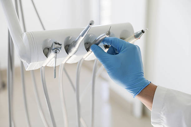 Professional Tooth Extraction technician working in Decatur, MI
